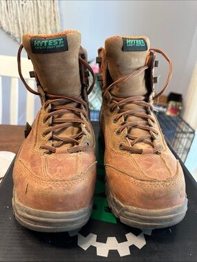 Well worn Hytest steel toe boots